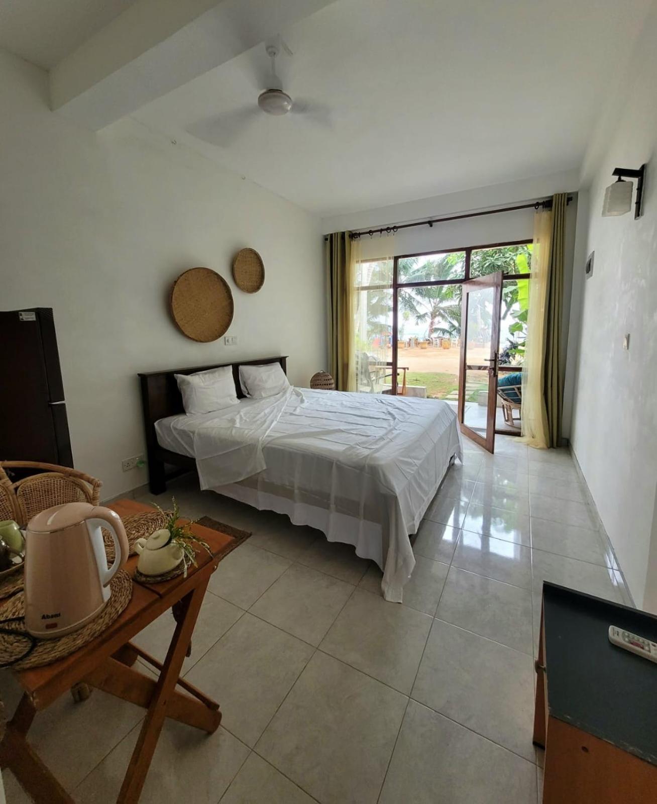 Coconut Palm Beach Restaurant And Rooms Диквелла Экстерьер фото